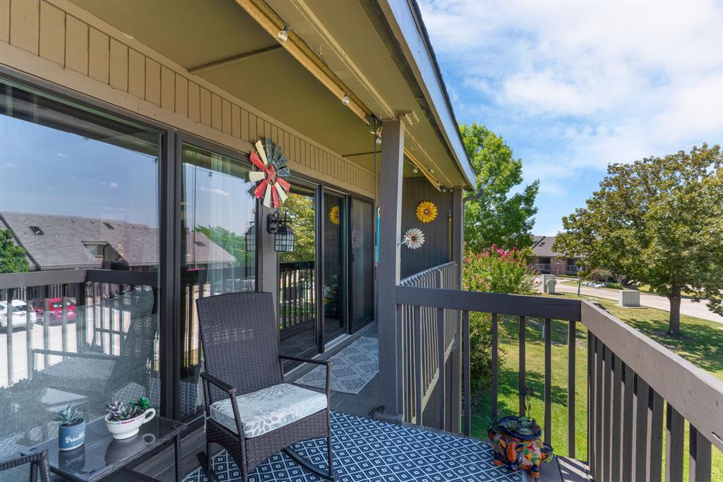 814 Signal Ridge Place Rockwall, TX 75032 - Photo 2 of 26 Large back balcony with partial lake view