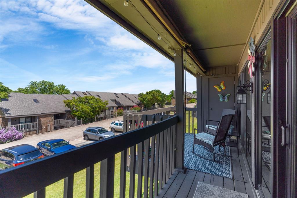 814 Signal Ridge Place Rockwall, TX 75032 - Photo 24 of 26 Large back balcony with partial lake view