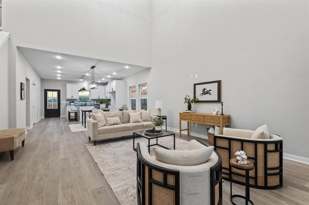 3632 County Road Blossom, TX 75416 - Photo 12 of 36 a living room with furniture and a dining table with rug