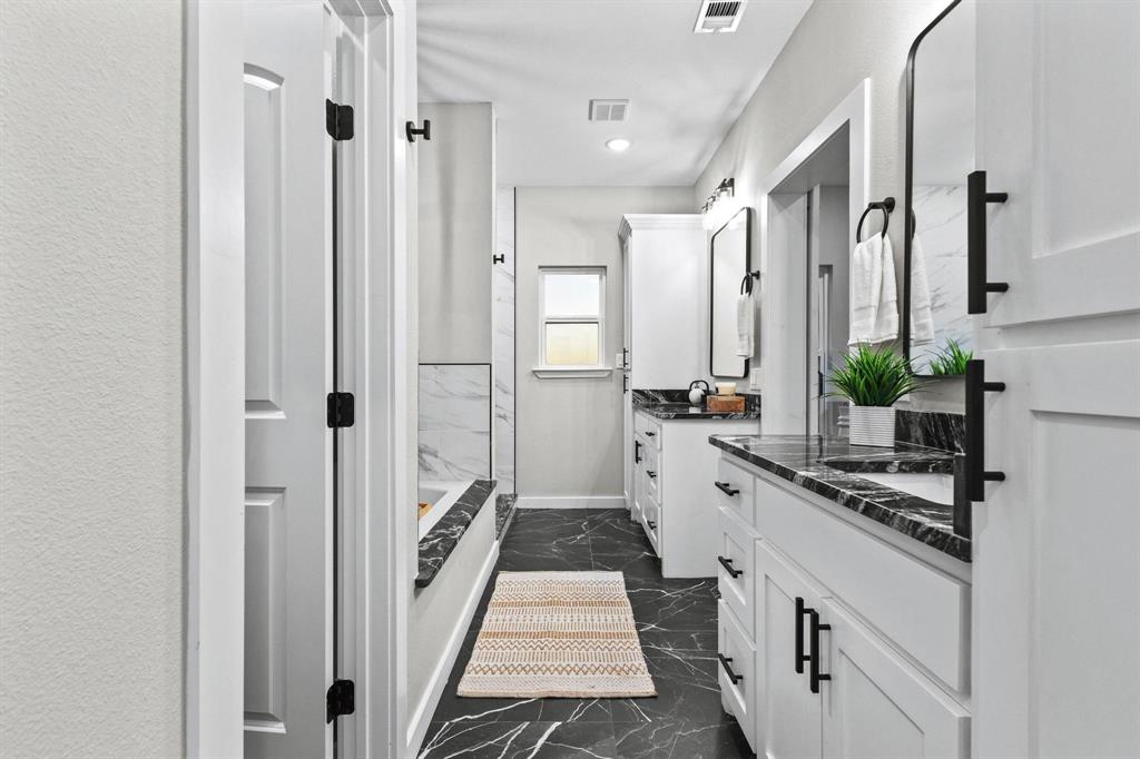 3632 County Road Blossom, TX 75416 - Photo 18 of 36 a large white kitchen with stainless steel appliances