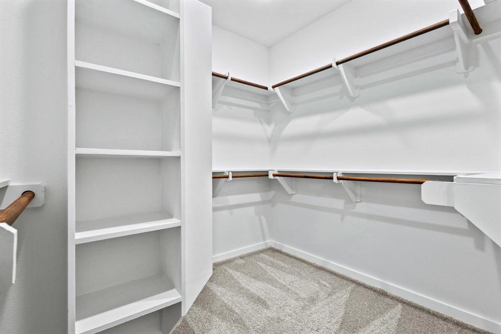 3632 County Road Blossom, TX 75416 - Photo 21 of 36 a view of an empty walk in closet
