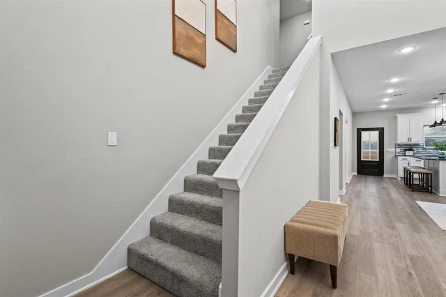 a view of room with window and ceiling fan