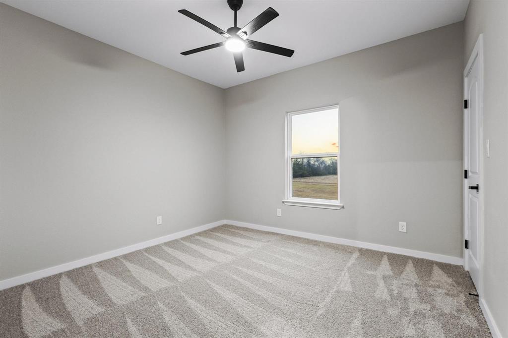 3632 County Road Blossom, TX 75416 - Photo 28 of 36 a view of an empty room with a window