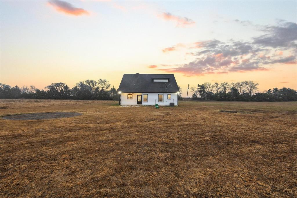 3632 County Road Blossom, TX 75416 - Photo 29 of 36 a view of a lake with houses