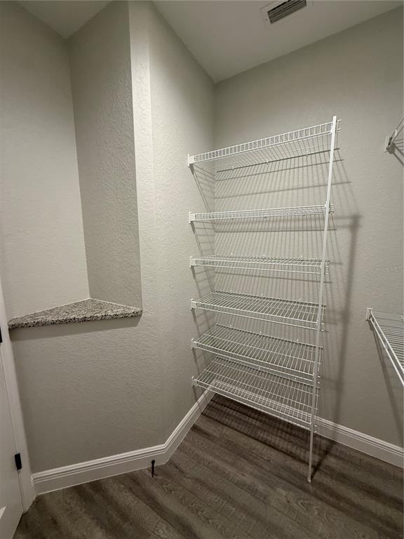 26267 Explorer Road Punta Gorda, FL 33983 - Photo 16 of 27 a view of small space with racks on the wall