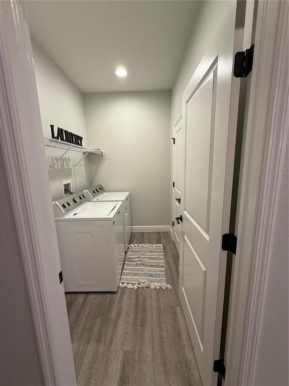 26267 Explorer Road Punta Gorda, FL 33983 - Photo 22 of 27 a bathroom with a sink a toilet a mirror and shower