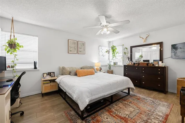 a bedroom with a bed and a furniture