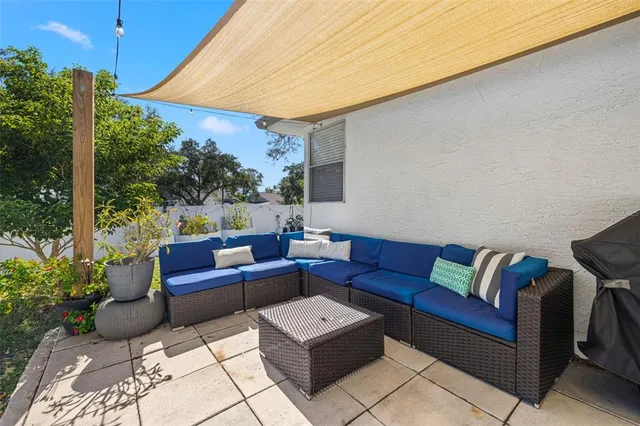 a outdoor living space with furniture and garden view
