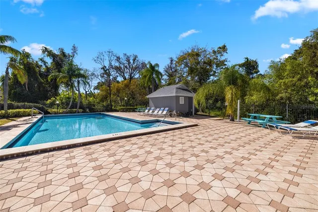 a view of swimming pool with a yard