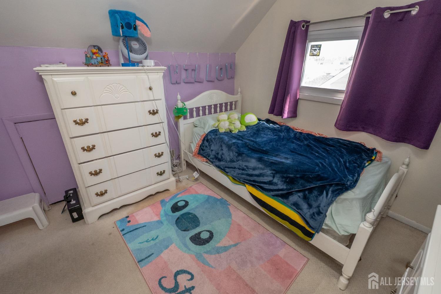 258 Sunset Avenue Old Bridge, NJ 08857 - Photo 14 of 27 a bed in a bedroom next to a window