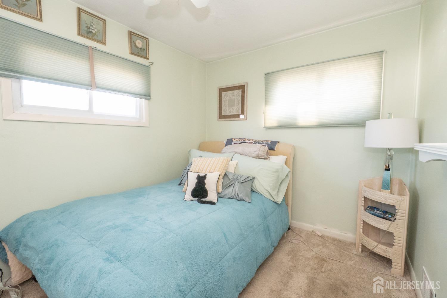 258 Sunset Avenue Old Bridge, NJ 08857 - Photo 17 of 27 a bedroom with a bed and a window