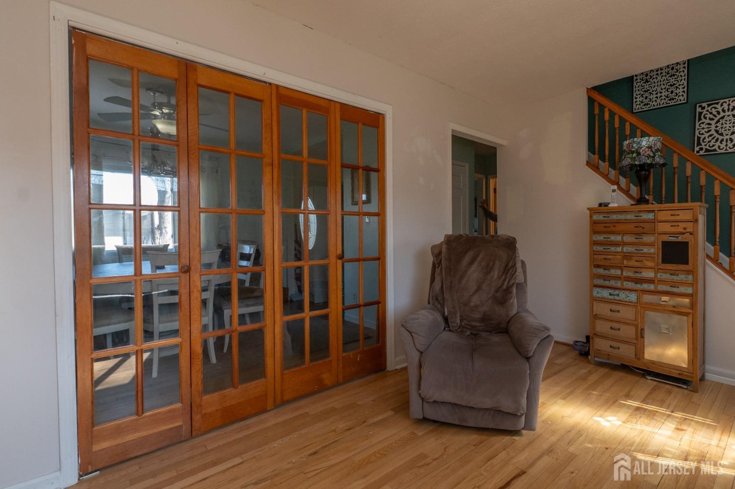 258 Sunset Avenue Old Bridge, NJ 08857 - Photo 4 of 27 a living room with furniture hardwood floor and a ceiling fan