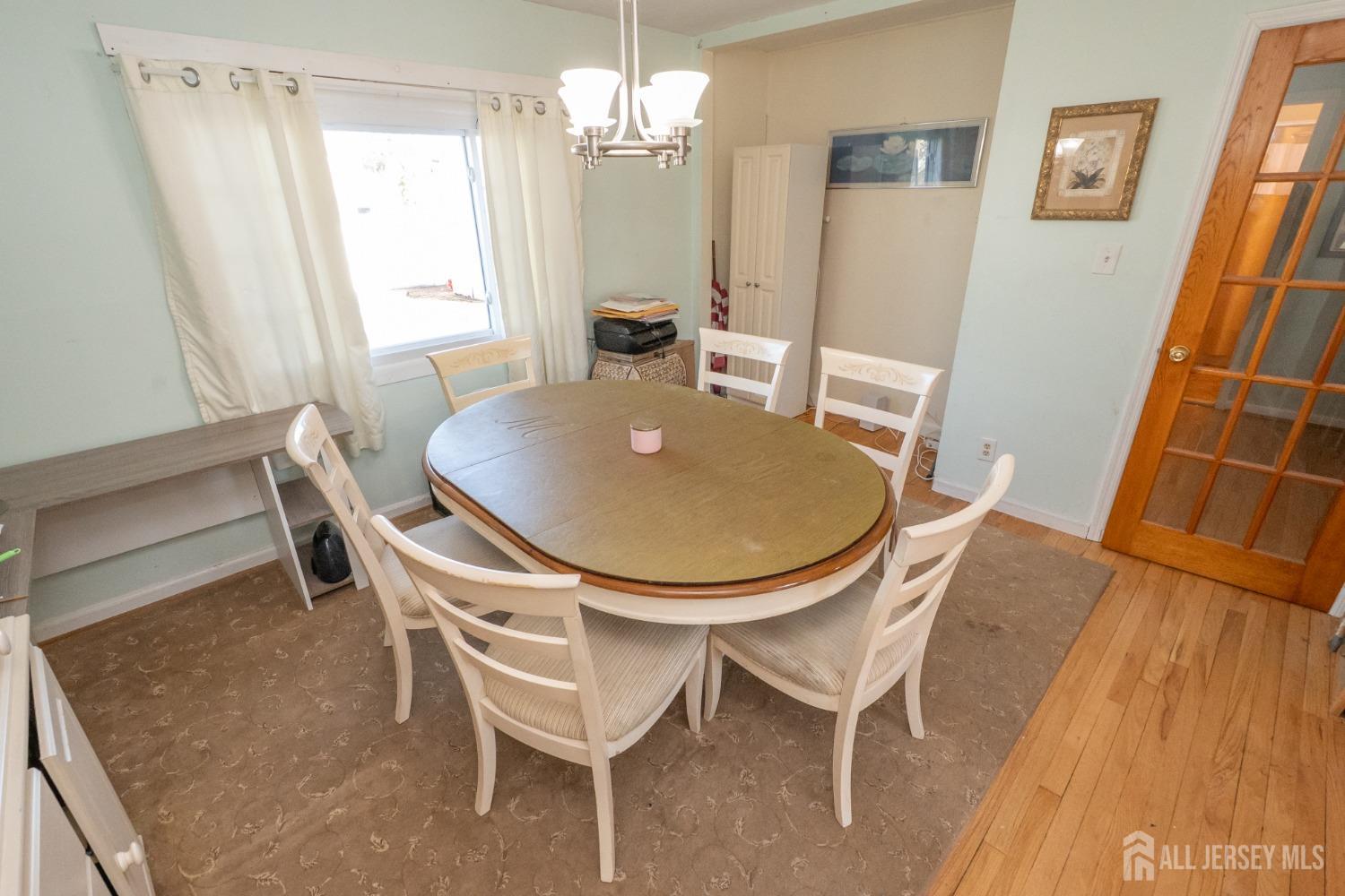 258 Sunset Avenue Old Bridge, NJ 08857 - Photo 8 of 27 a dining room with furniture and window