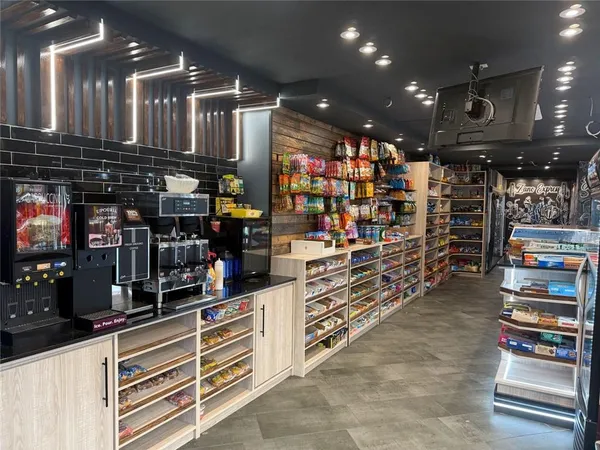 a kitchen with storage and utility