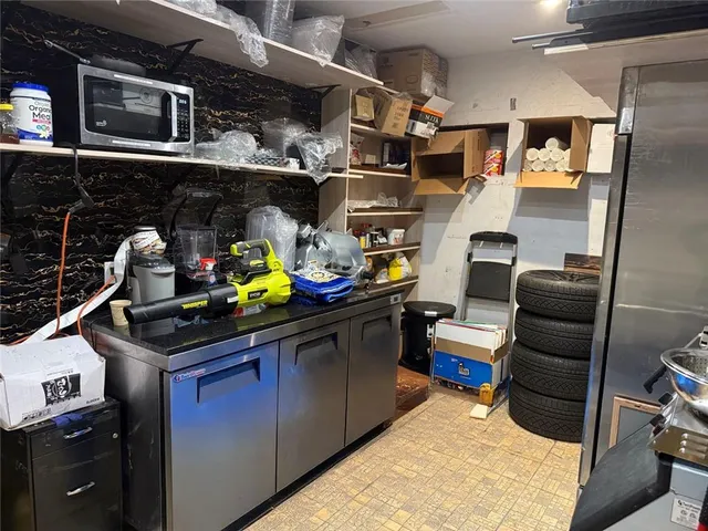 a view of a city street with cars