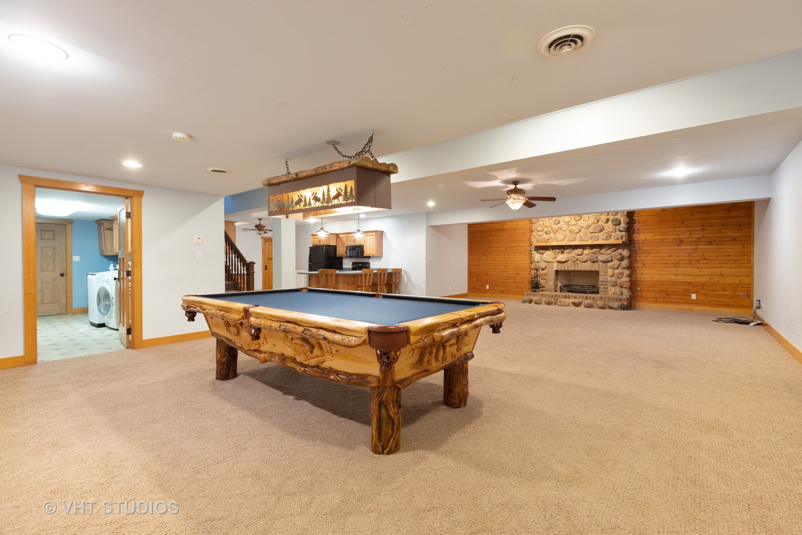 3005 East Spring Road Mazon, IL 60444 - Photo 22 of 28 a living room with furniture pool table and a flat screen tv