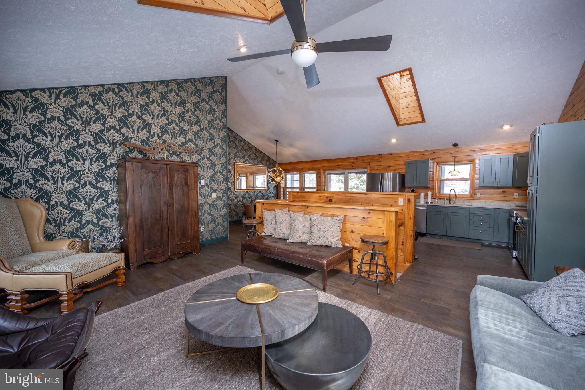 300 Normas Way McHenry, MD 21541 - Photo 11 of 48 a living room with furniture and a wooden floor