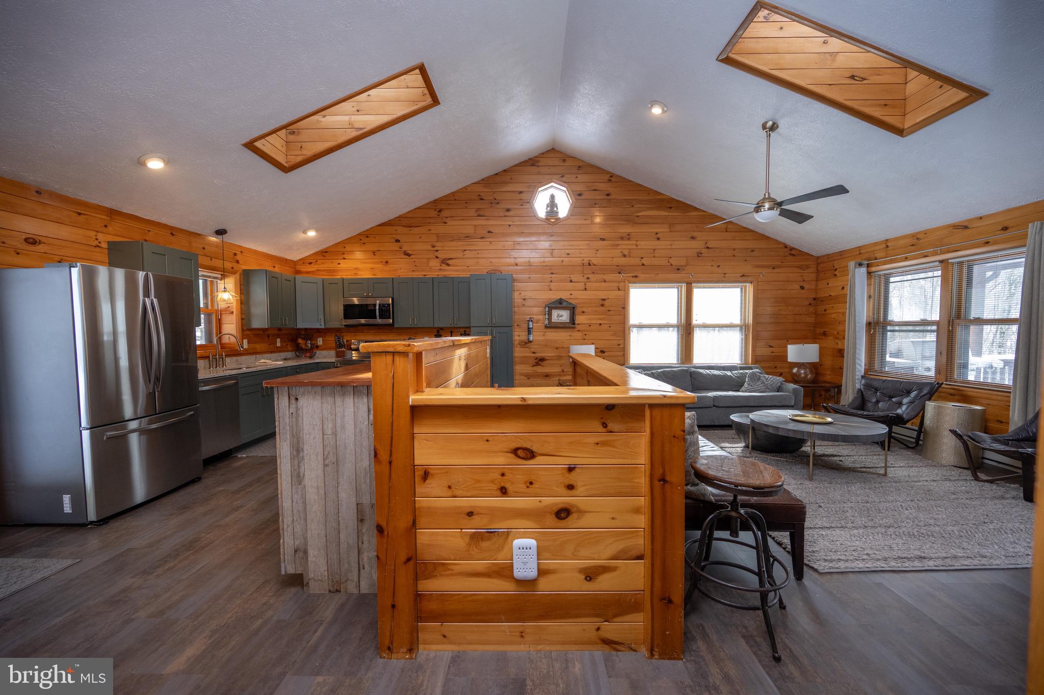 300 Normas Way McHenry, MD 21541 - Photo 14 of 48 a kitchen with a refrigerator and a stove