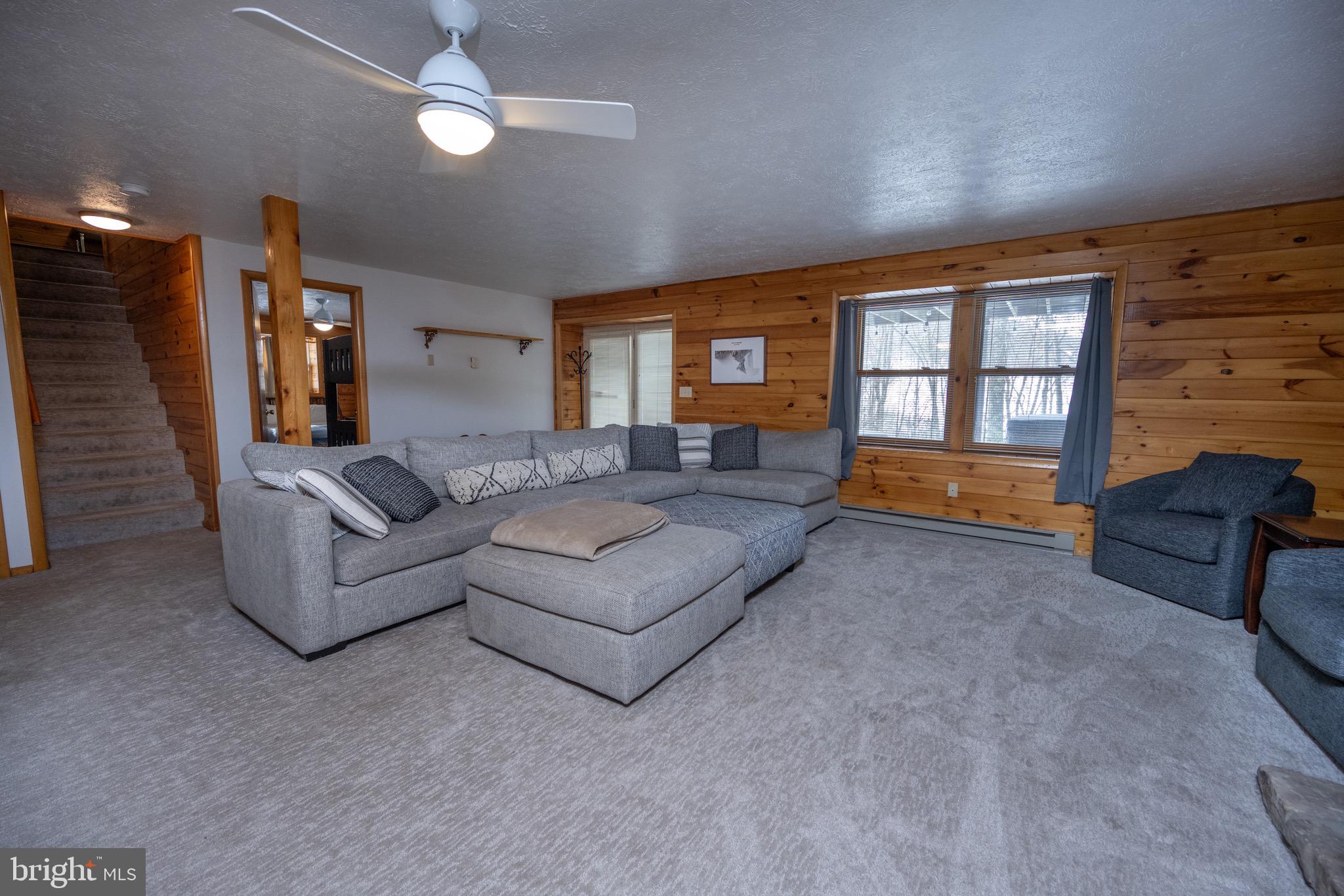 300 Normas Way McHenry, MD 21541 - Photo 24 of 48 a living room with furniture and a window