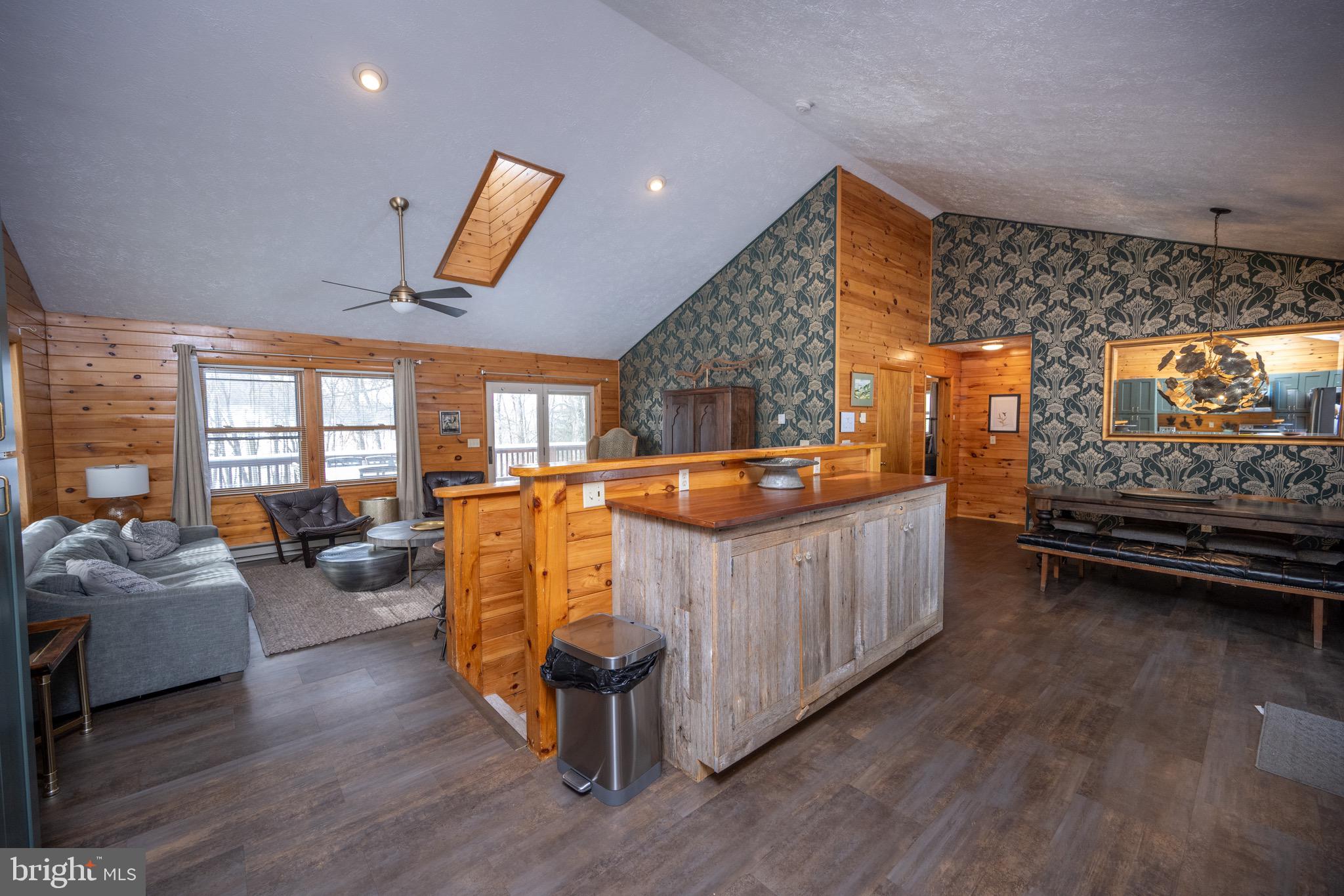 300 Normas Way McHenry, MD 21541 - Photo 3 of 48 a living room with furniture and a flat screen tv