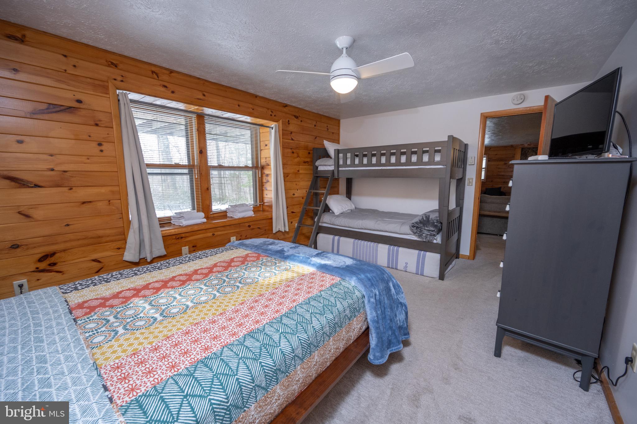 300 Normas Way McHenry, MD 21541 - Photo 31 of 48 a bedroom with a bed and a television