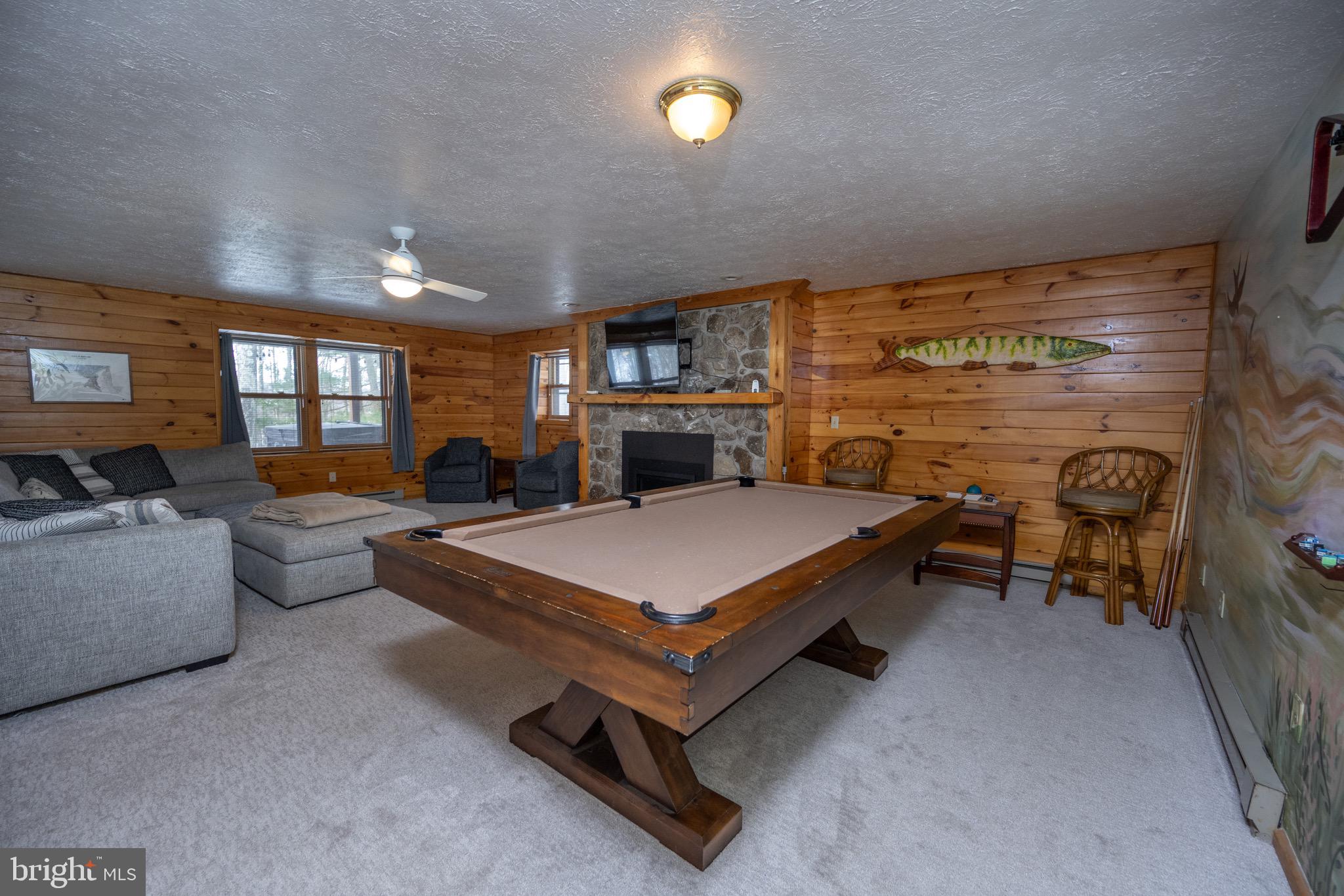 300 Normas Way McHenry, MD 21541 - Photo 39 of 48 a living room with furniture pool table and a large window