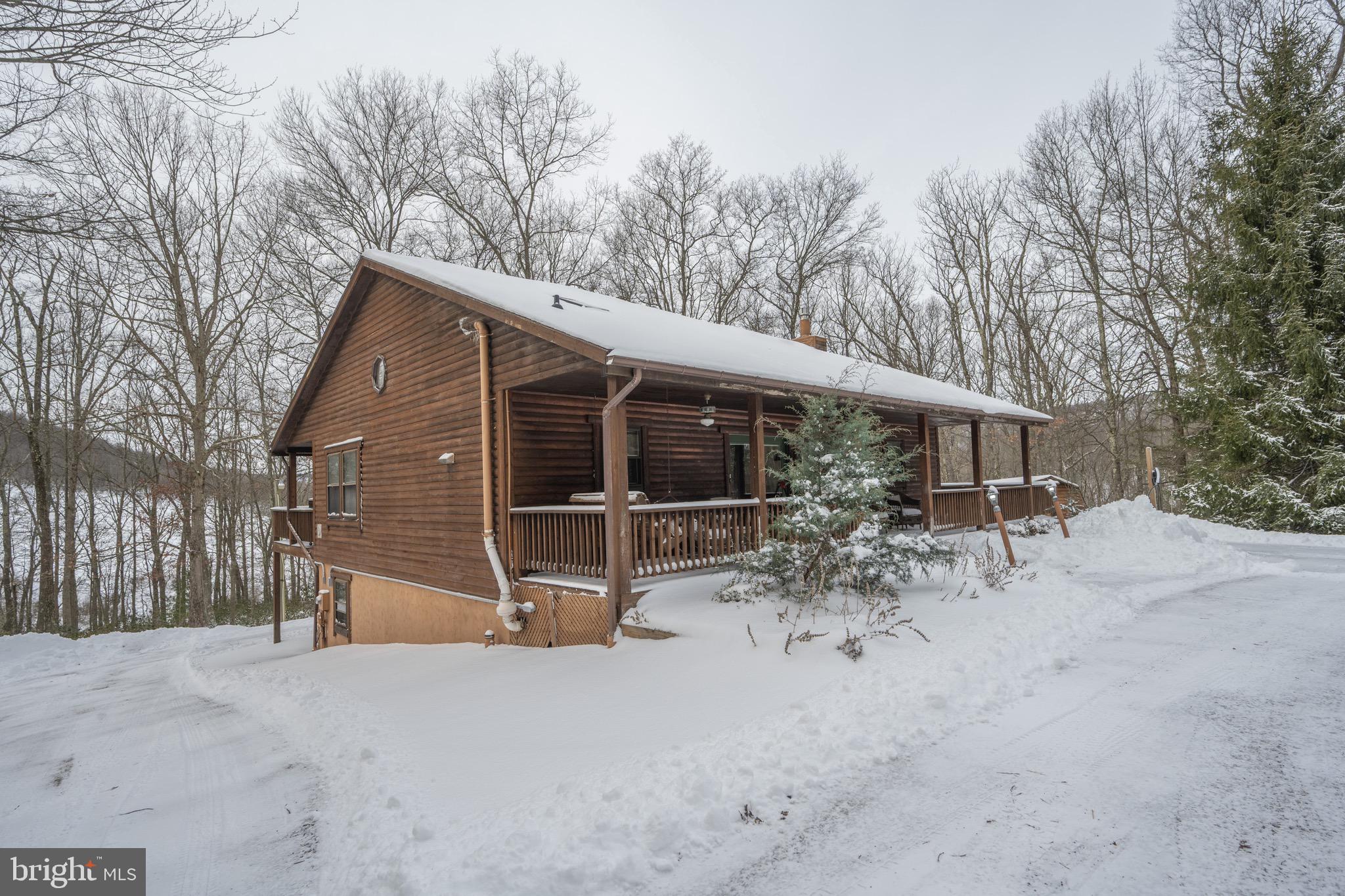 300 Normas Way McHenry, MD 21541 - Photo 47 of 48 a view of a house with backyard and sitting area