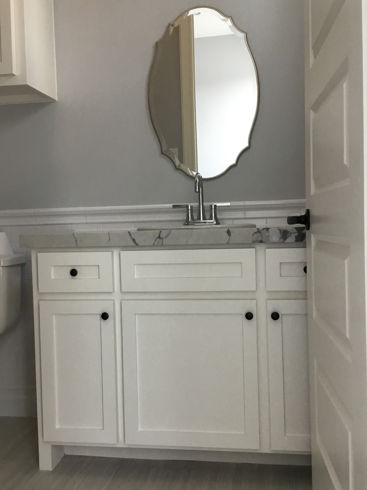 1116 Bartlett Street, Unit B Houston, TX 77006 - Photo 14 of 22 a bathroom with a mirror and vanity