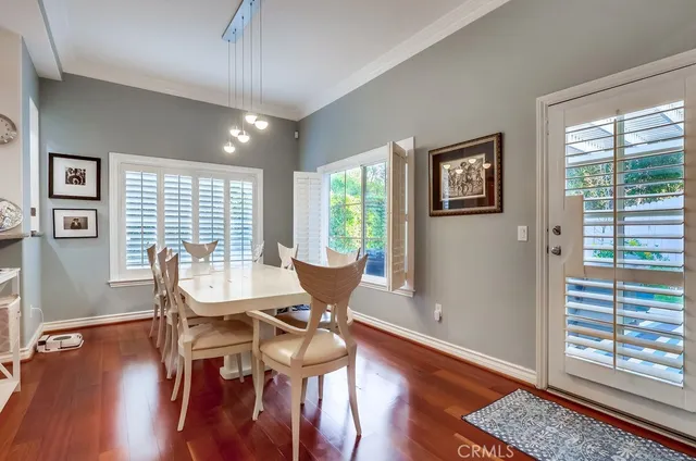 a kitchen with granite countertop sink stove and cabinets