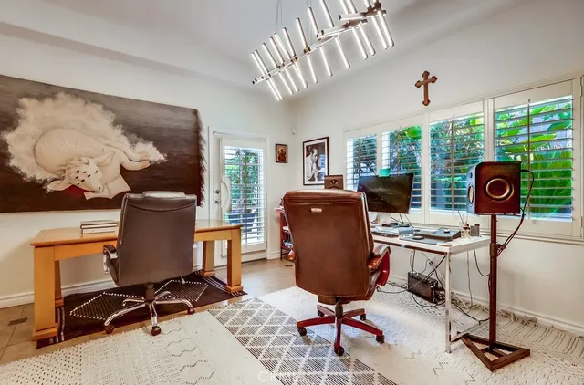 a workspace with wooden floor and a workspace