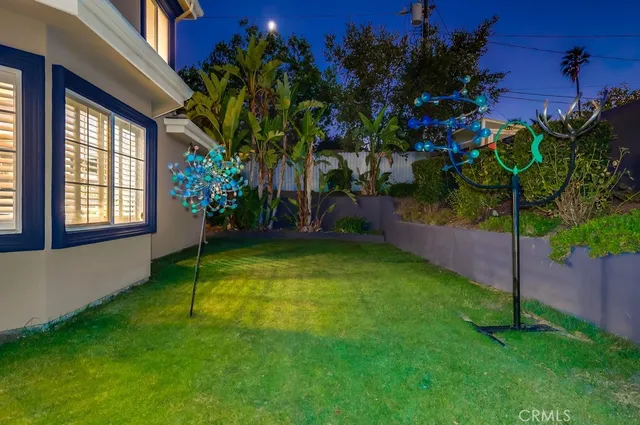 a view of an house with backyard porch and entertaining space