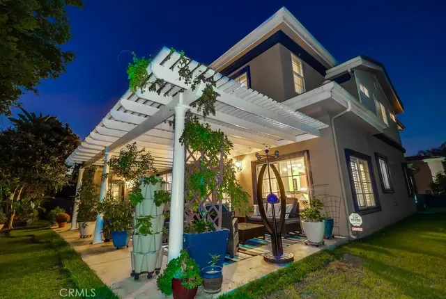 a outdoor living space with patio furniture and a potted plant