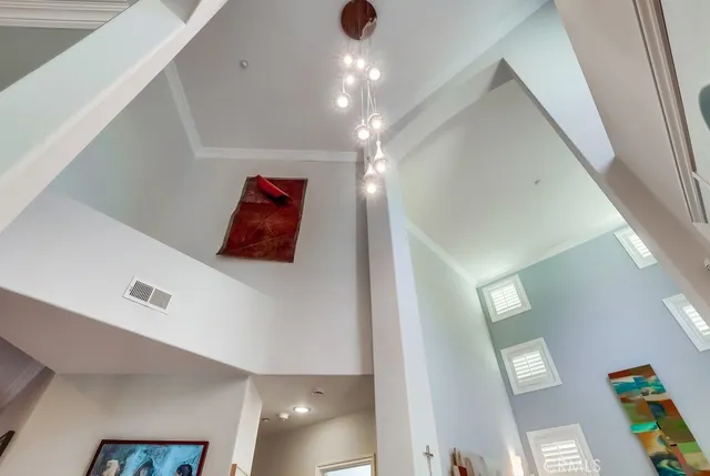 a living room with furniture fireplace and window