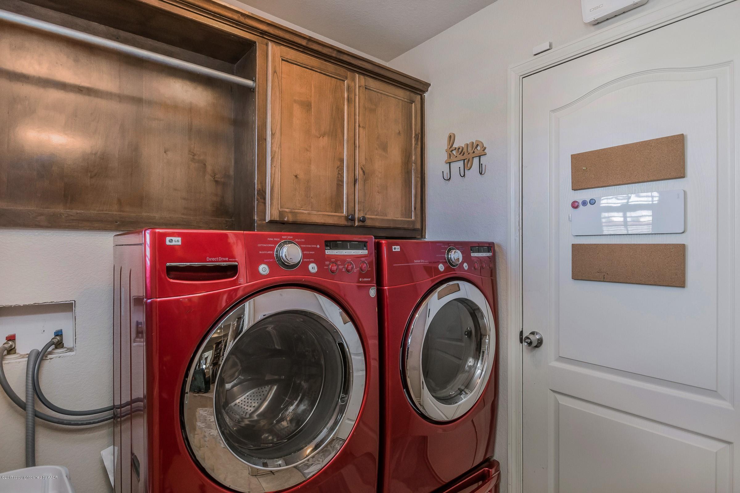 5308 Pleasant Court Amarillo, TX 79110 - Photo 11 of 19 a utility room with dryer and washer