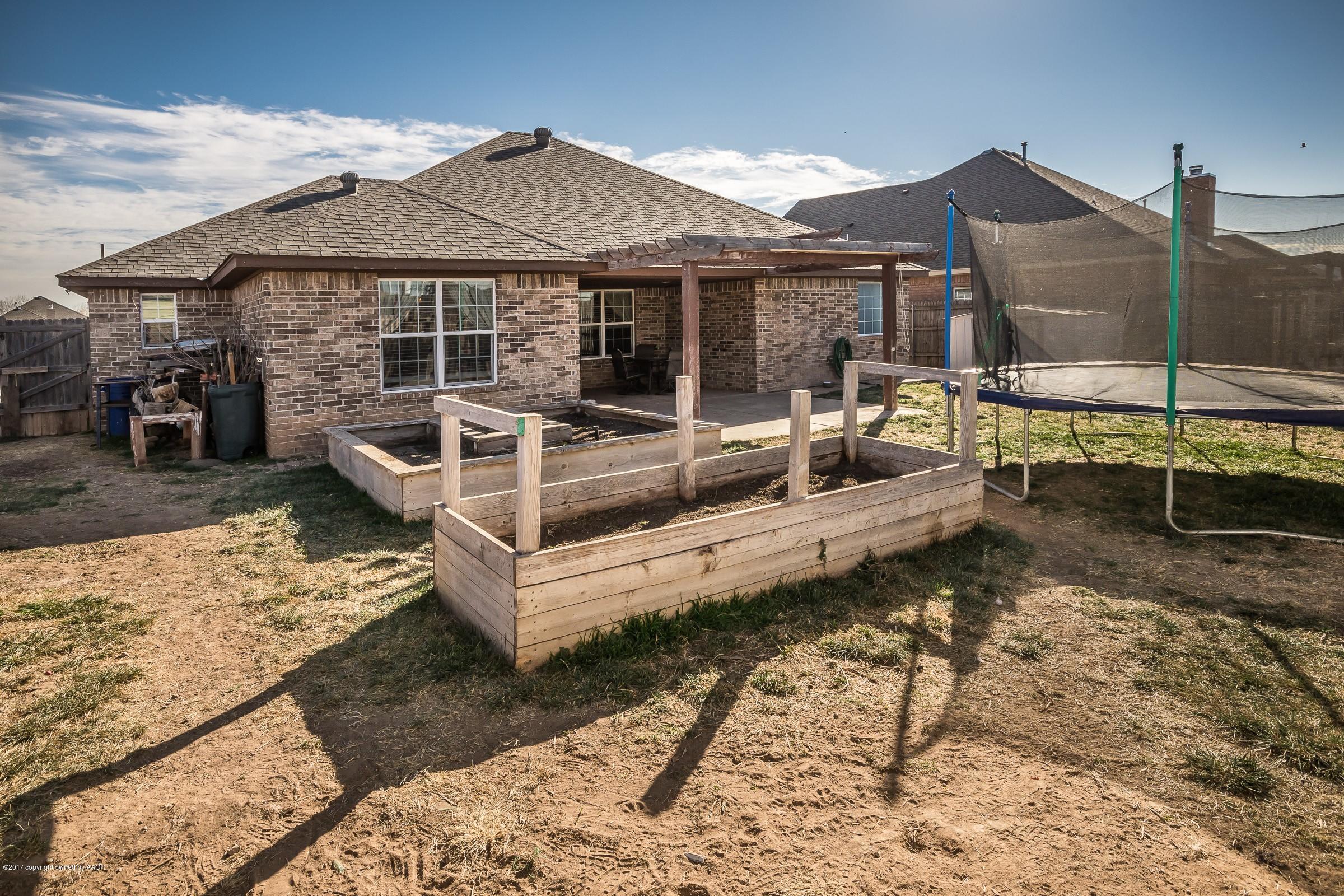 5308 Pleasant Court Amarillo, TX 79110 - Photo 18 of 19 a view of a house with backyard and sitting area