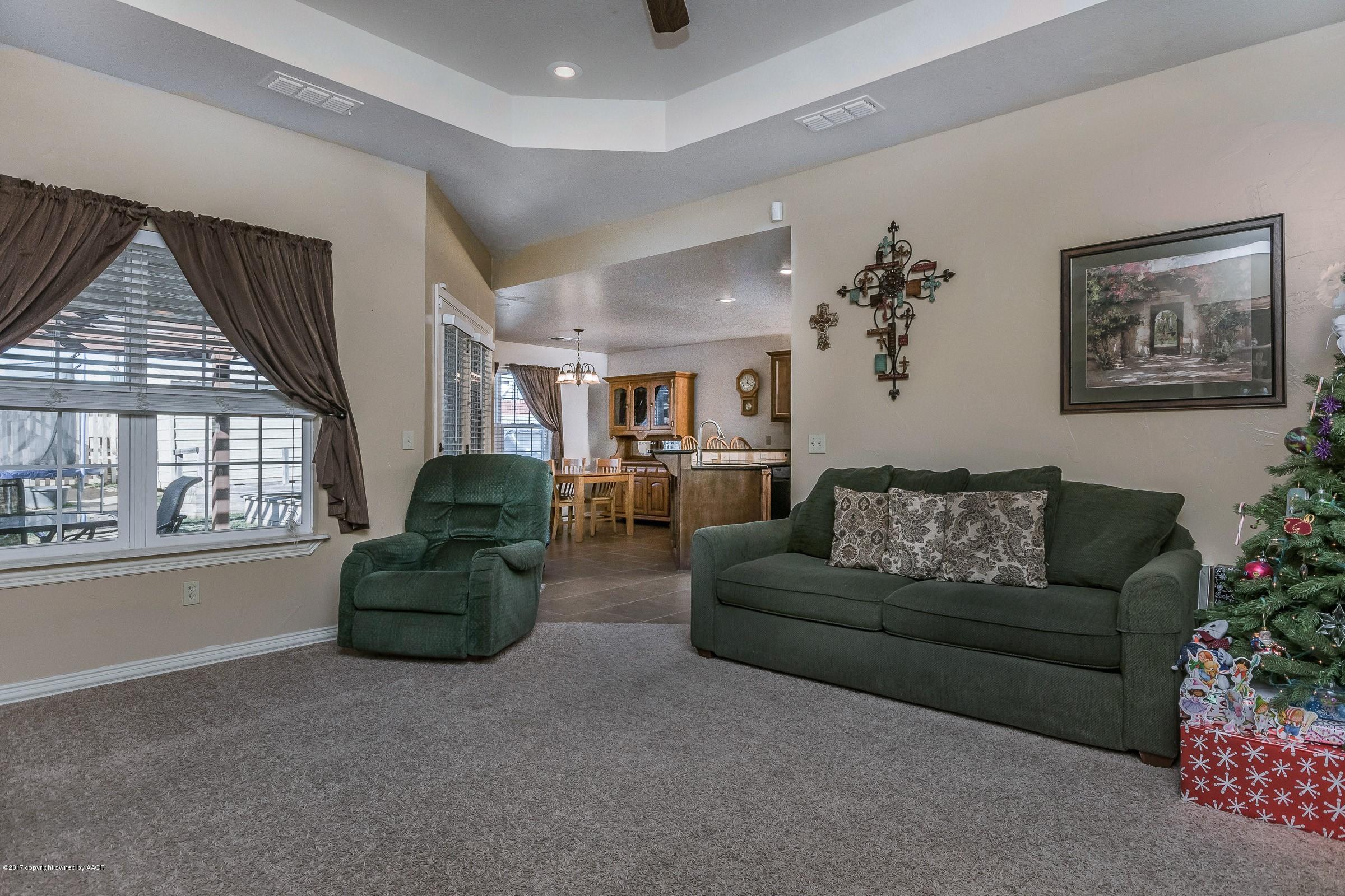 5308 Pleasant Court Amarillo, TX 79110 - Photo 6 of 19 a living room with furniture and a large window