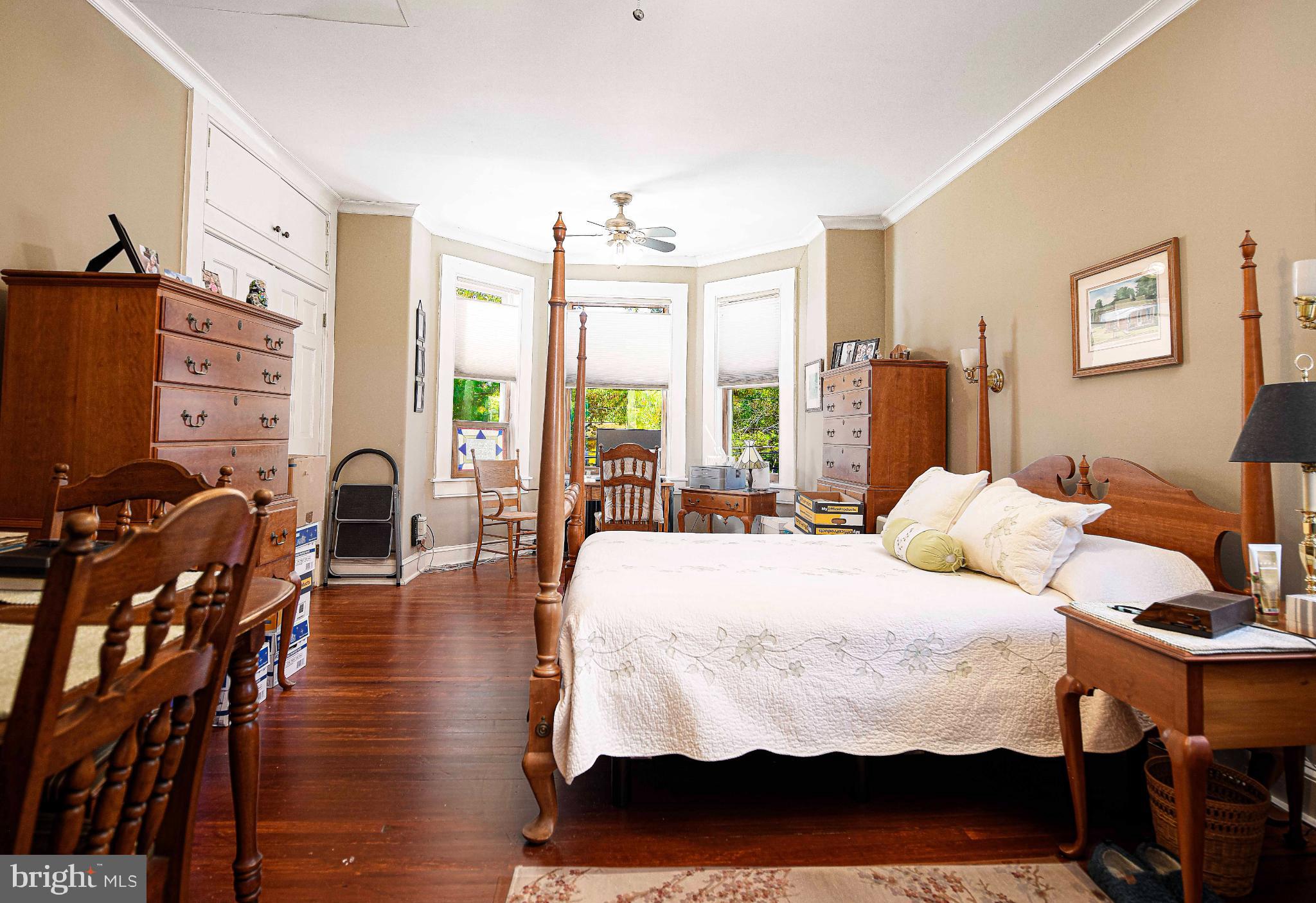 1537 South Rolling Road Halethorpe, MD 21227 - Photo 11 of 24 a bedroom with furniture and wooden floor