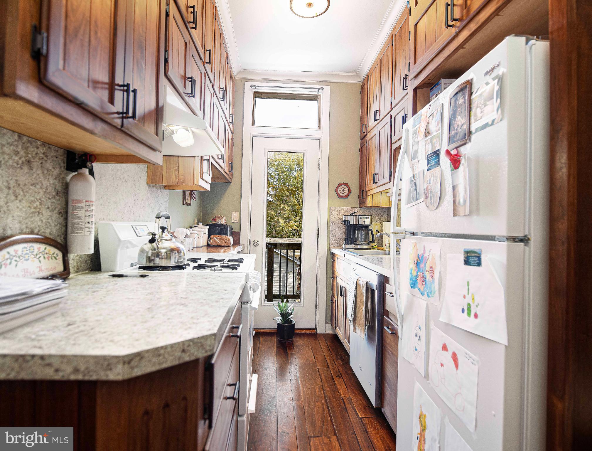 1537 South Rolling Road Halethorpe, MD 21227 - Photo 13 of 24 a kitchen view with granite countertop a appliances and a counter space
