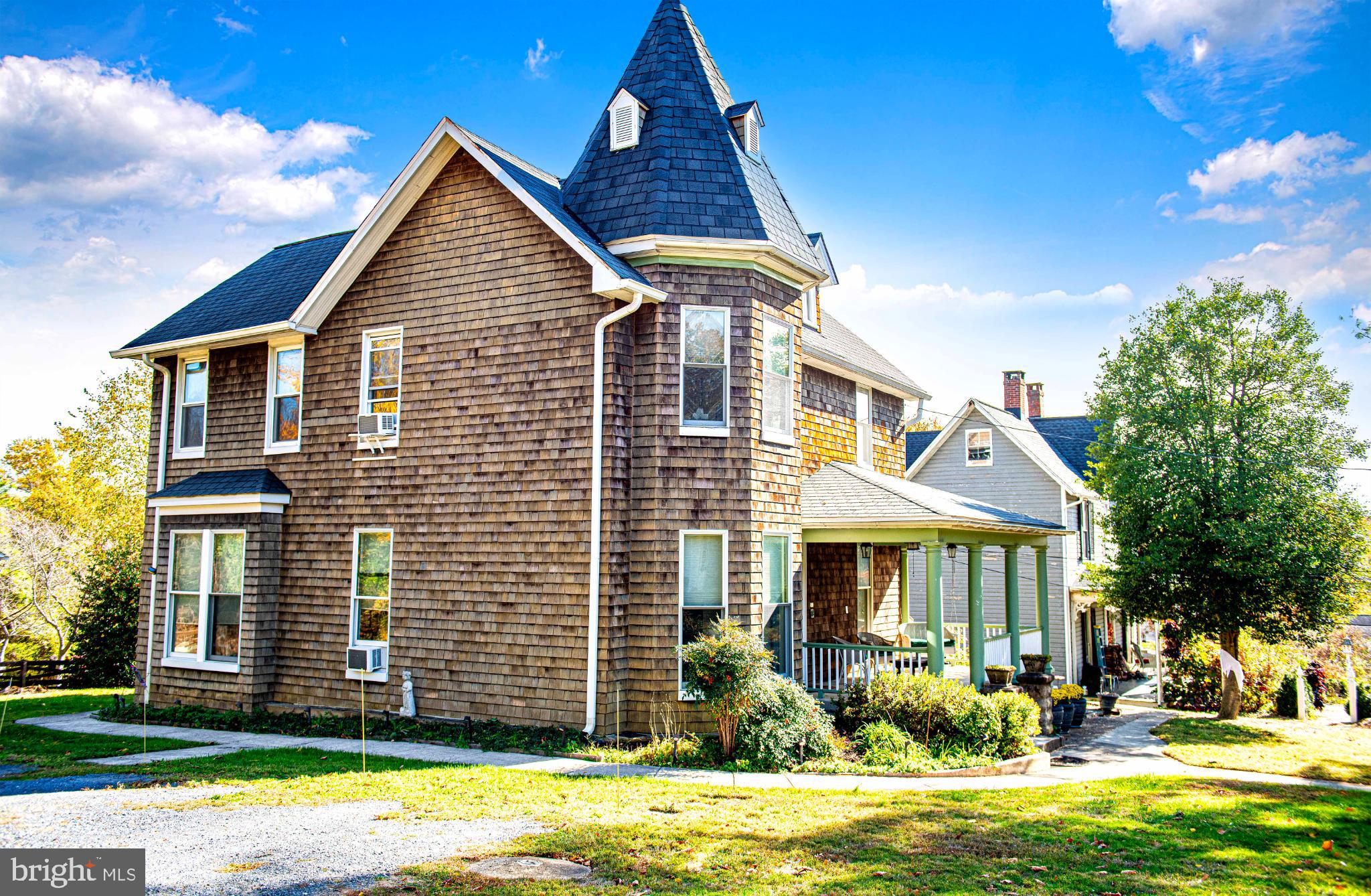 1537 South Rolling Road Halethorpe, MD 21227 - Photo 3 of 24 a front view of a house with a yard