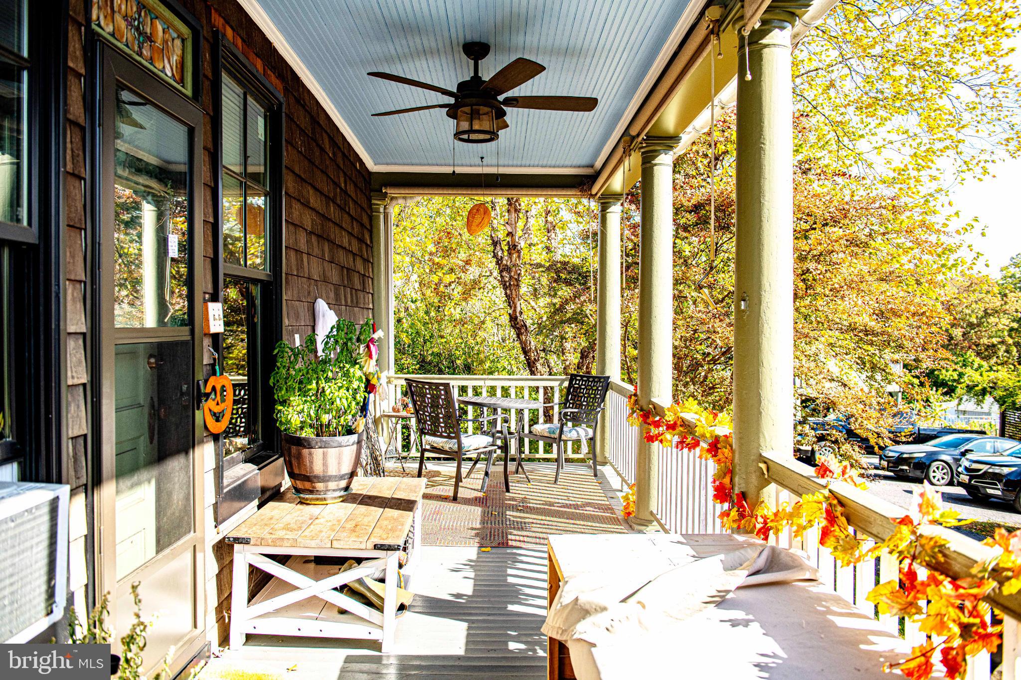 1537 South Rolling Road Halethorpe, MD 21227 - Photo 7 of 24 a view of living room filled with furniture and floor to ceiling windows