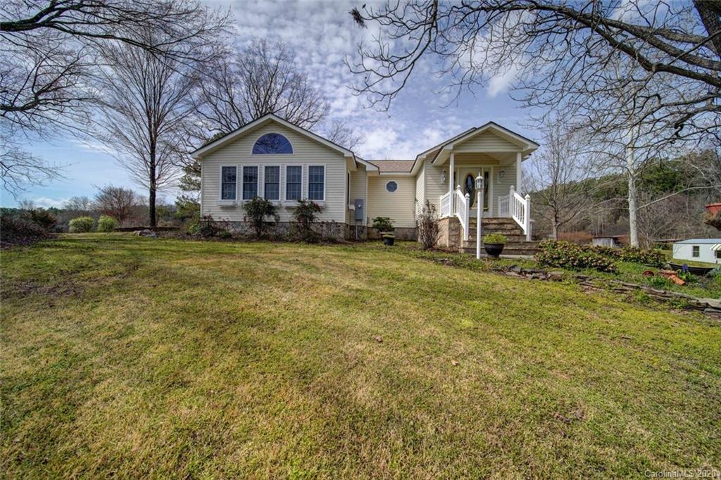 36435 Finger Road Mount Pleasant, NC 28124 - Photo 1 of 37 a front view of a house with garden