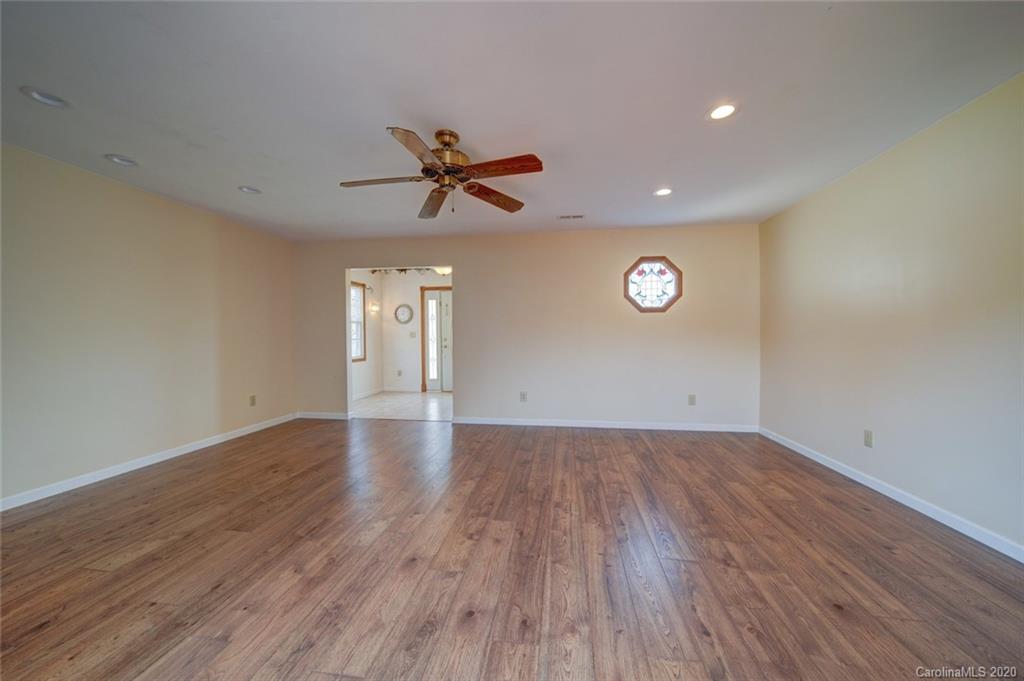 36435 Finger Road Mount Pleasant, NC 28124 - Photo 13 of 37 a view of an empty room and wooden floor