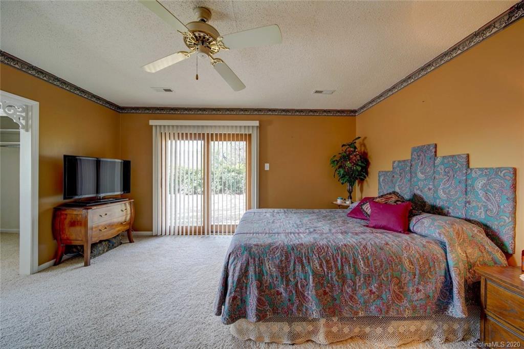 36435 Finger Road Mount Pleasant, NC 28124 - Photo 16 of 37 a bed room with a bed and a chair