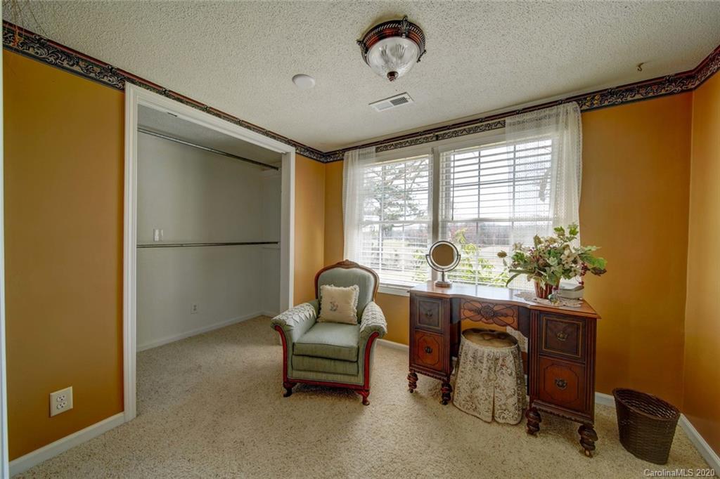36435 Finger Road Mount Pleasant, NC 28124 - Photo 18 of 37 a living room with furniture and a window