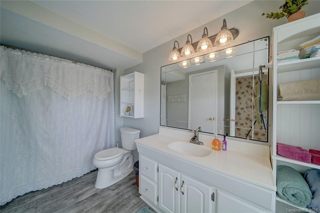 36435 Finger Road Mount Pleasant, NC 28124 - Photo 19 of 37 a bathroom with a sink and a mirror