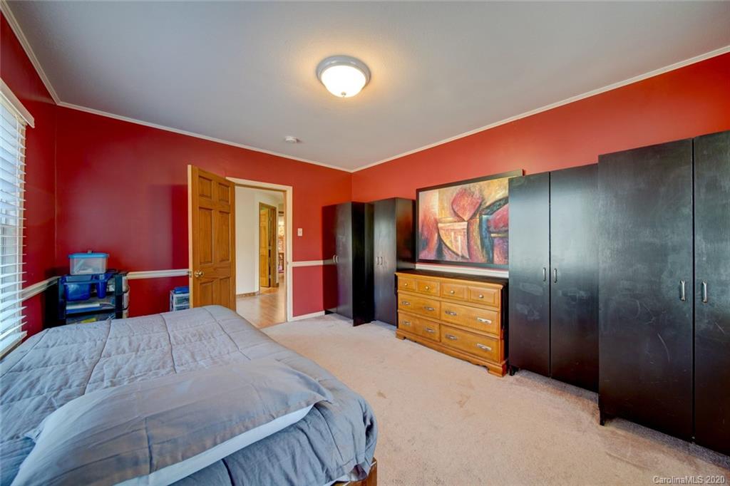 36435 Finger Road Mount Pleasant, NC 28124 - Photo 24 of 37 a bedroom with a bed and a dresser