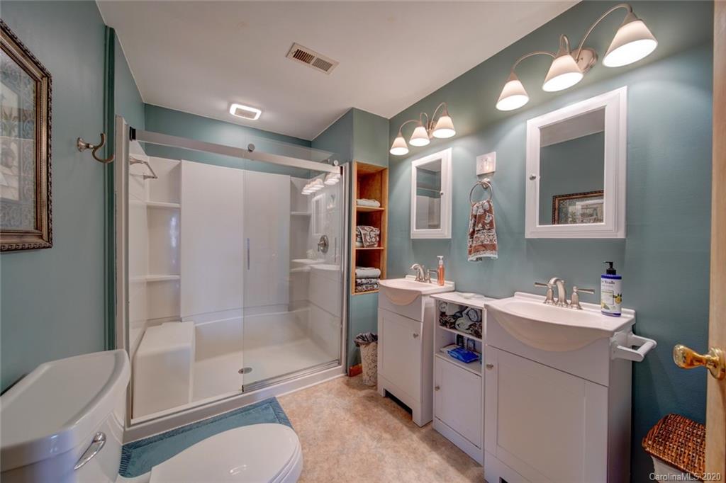 36435 Finger Road Mount Pleasant, NC 28124 - Photo 25 of 37 a bathroom with a sink toilet tub and shower