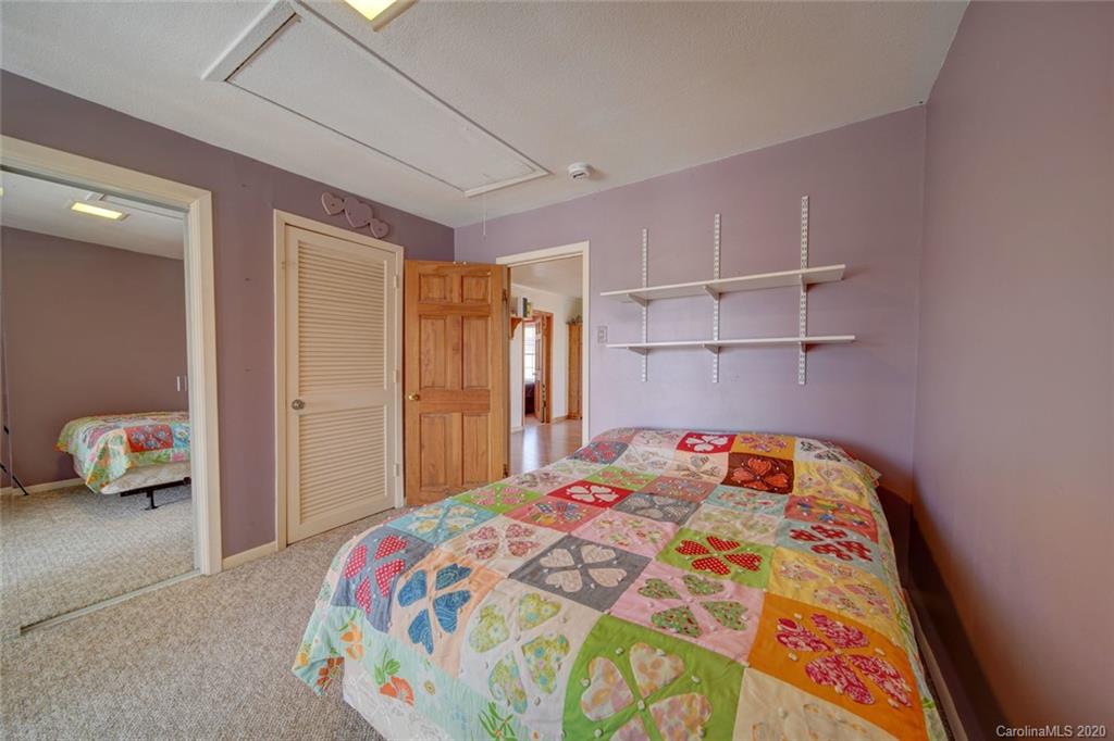 36435 Finger Road Mount Pleasant, NC 28124 - Photo 26 of 37 a bedroom with a bed and a window
