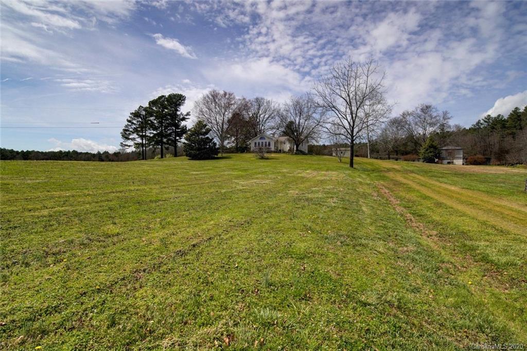 36435 Finger Road Mount Pleasant, NC 28124 - Photo 35 of 37 a view of a field with houses in back