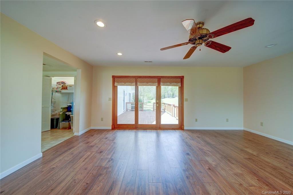 36435 Finger Road Mount Pleasant, NC 28124 - Photo 5 of 37 a view of empty room with wooden floor